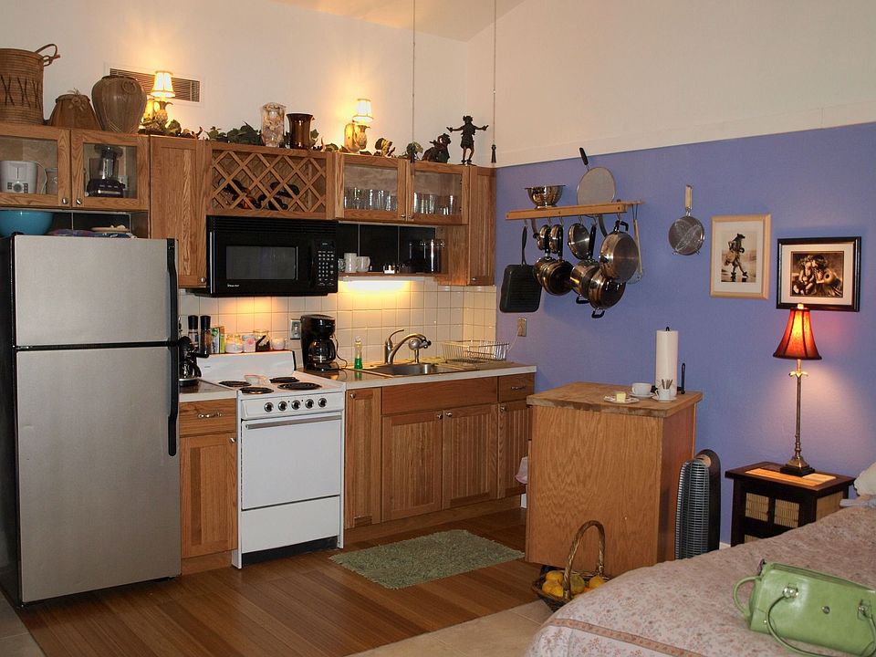 Kitchen boasts granite counters, KraftMaid oak cabinets, maple butcher block!