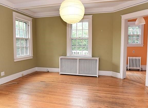 Dining room with beamed ceilings.