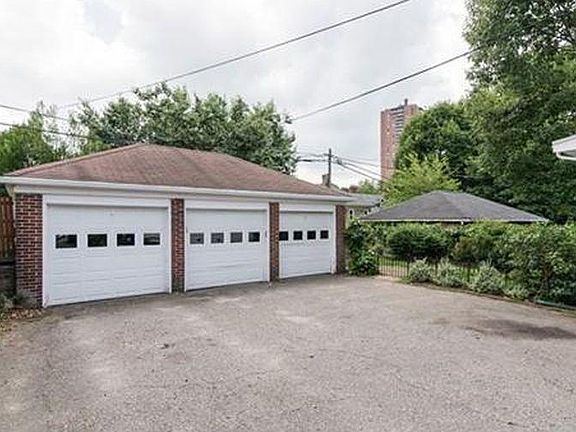 Middle and right garage bays, partial fenced back yard, able to put outdoor furniture and grill
