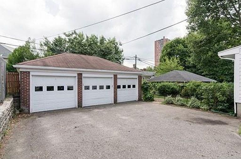 Middle and right garage bays, partial fenced back yard, able to put outdoor furniture and grill