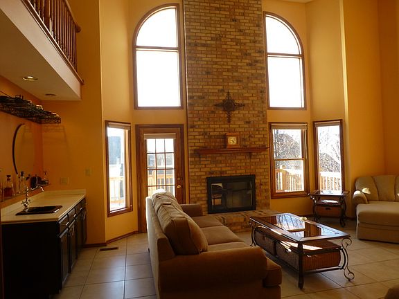 Great Room
						:
						Wall of windows and two skylights with vaulted ceiling
