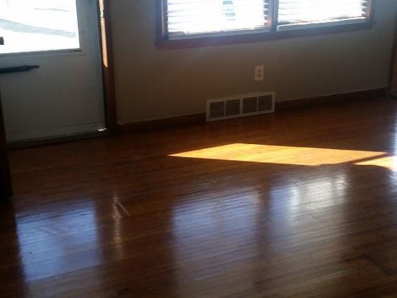 Living room area with wood floors