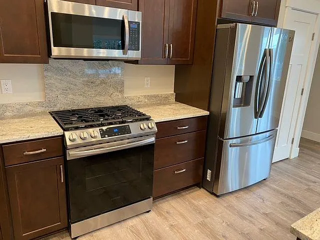 Gas Range, Microwave and 28 cu ft. fridge