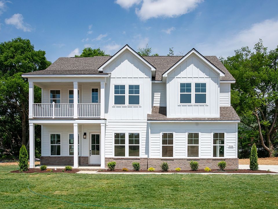Front exterior with white siding