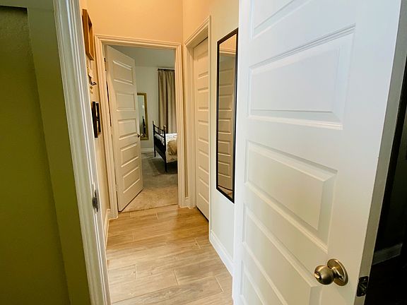 guest en-suite.straight ahead is the bedroom,kitchen on the left and bathroom to the right
