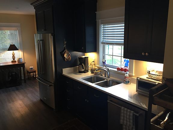 Updated Kitchen sink, refrigerator, dishwasher, under cabine