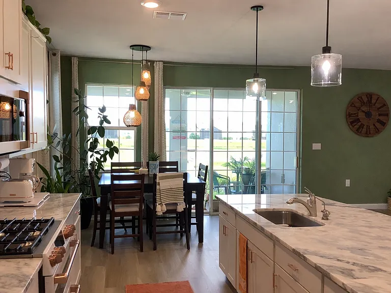 "Outside lanai and pond view from the breakfast nook and gourmet kitchen"