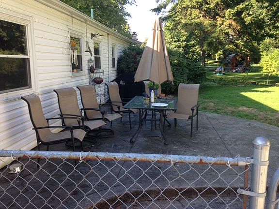 Large fenced back yard and patio