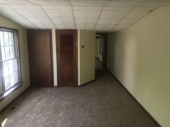 Living room, two closets w/ Bath