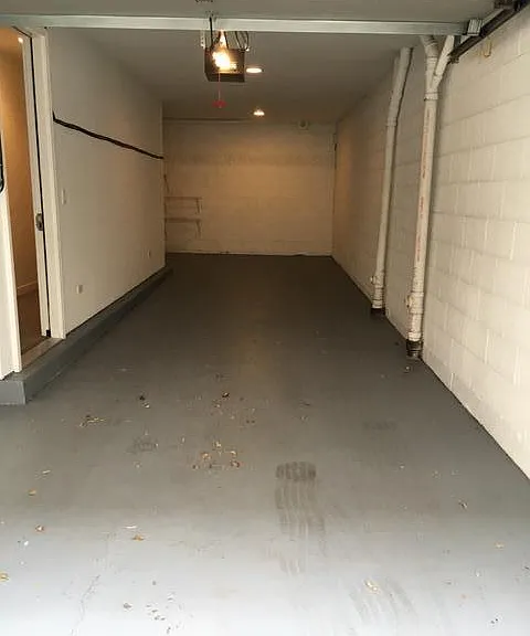 Huge attached tandem parking garage w/additional storage