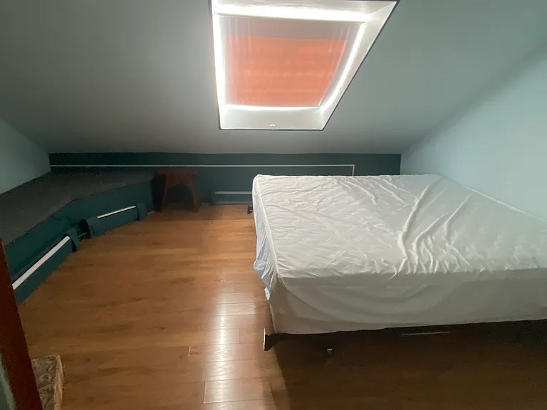 Second Floor Front Bedroom with King Bed provided with skylight - Lanning side of House