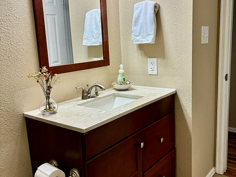 Full Bathroom: Sink & vanity with cabinet door and 2 good-sized drawers, mirror