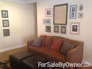 Living Room
						:
						Fireplace, built in shelves, recessed lighting and crown molding