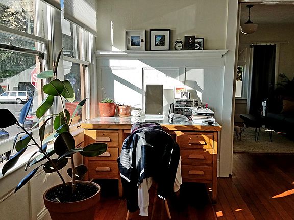 Work space in dining room with lots of light and people watching opportunities!