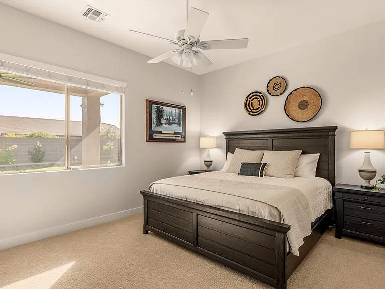 Second bedroom with plush king-size bed