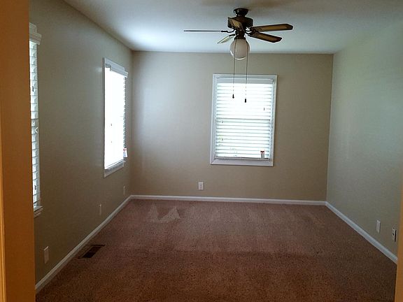 Master bedroom with 2 double closets, 3 large windows with b