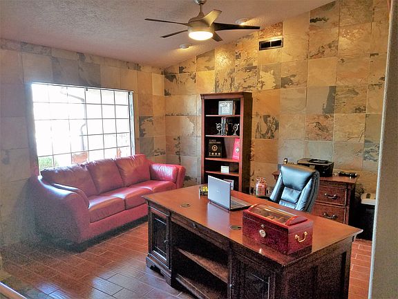 Offfice with slate walls