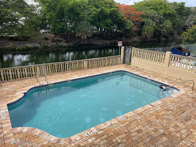 4275 NW South Tamiami Canal Dr #2-111 — Photo 14