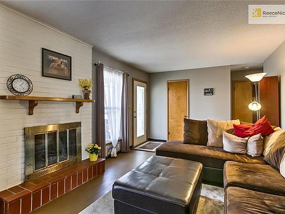 Enjoy cozy nights next to the brick wood burning fireplace.