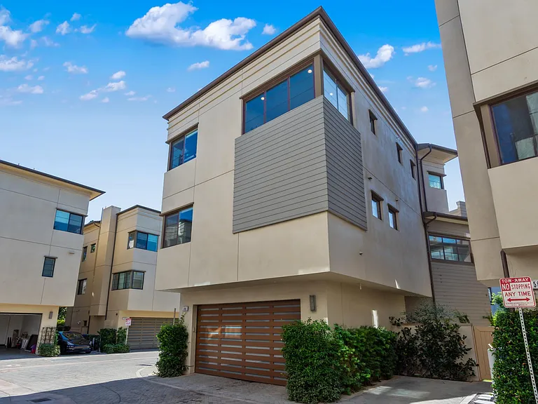 Exterior 2- Back 
- with one extra parking spot next to garage