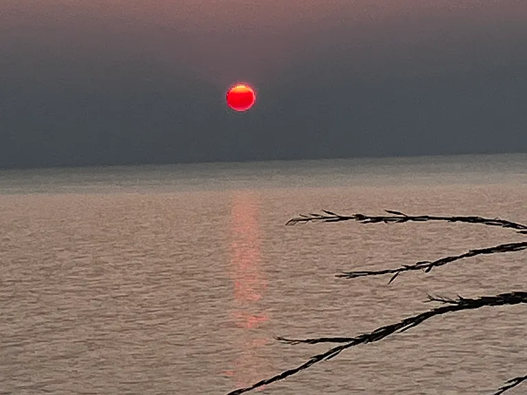 Sunset across the lake, see Toronto, Ontario Canada