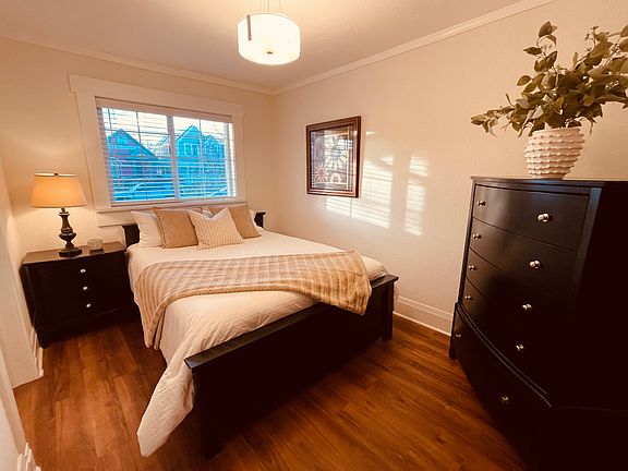 Queen bedroom with lots of natural light.