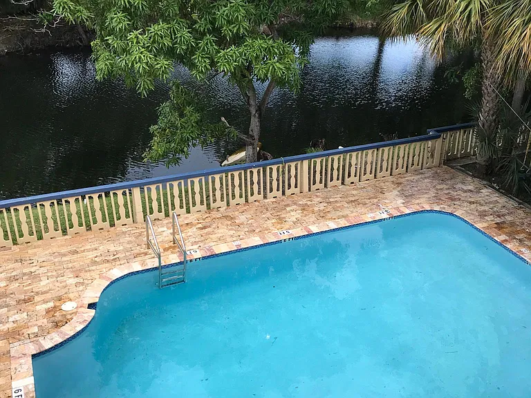 4301 NW South Tamiami Canal Dr #304 — Photo 10