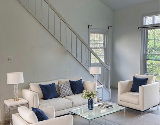 Living are -stairs lead up to loft area