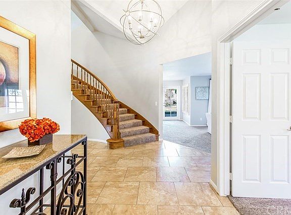Entryway. Door to the right is an office or main floor bedroom