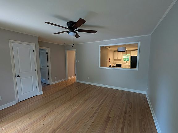 Spacious living room with passthrough counter to dining area