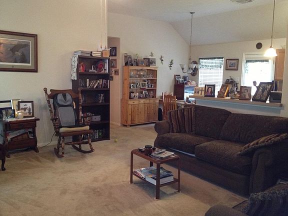 This is the view as you enter the home. Notice the open floor plan into the kitchen and dining area.