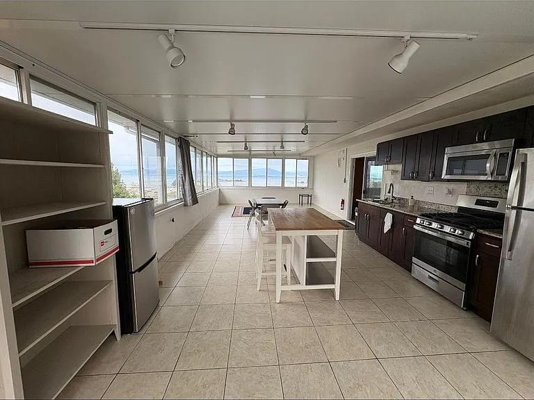 Living room with open kitchen