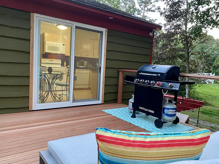 Gas grill with a burner