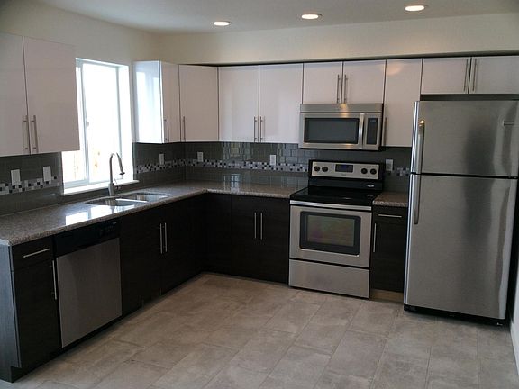 Eat in kitchen with patio door to back patio and 2 parking s