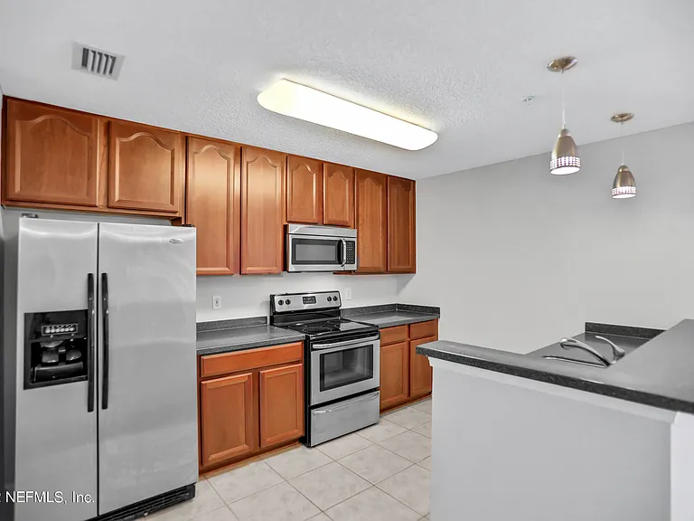 7051 Deer Lodge Cir #107 — Photo 10