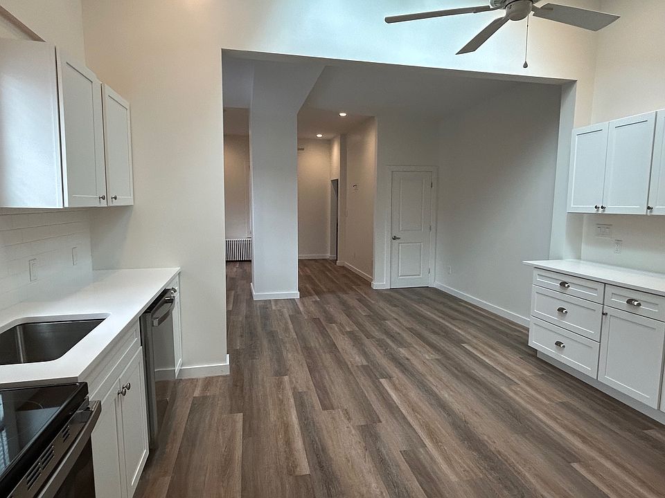 Kitchen. Looking into dining and living room areas