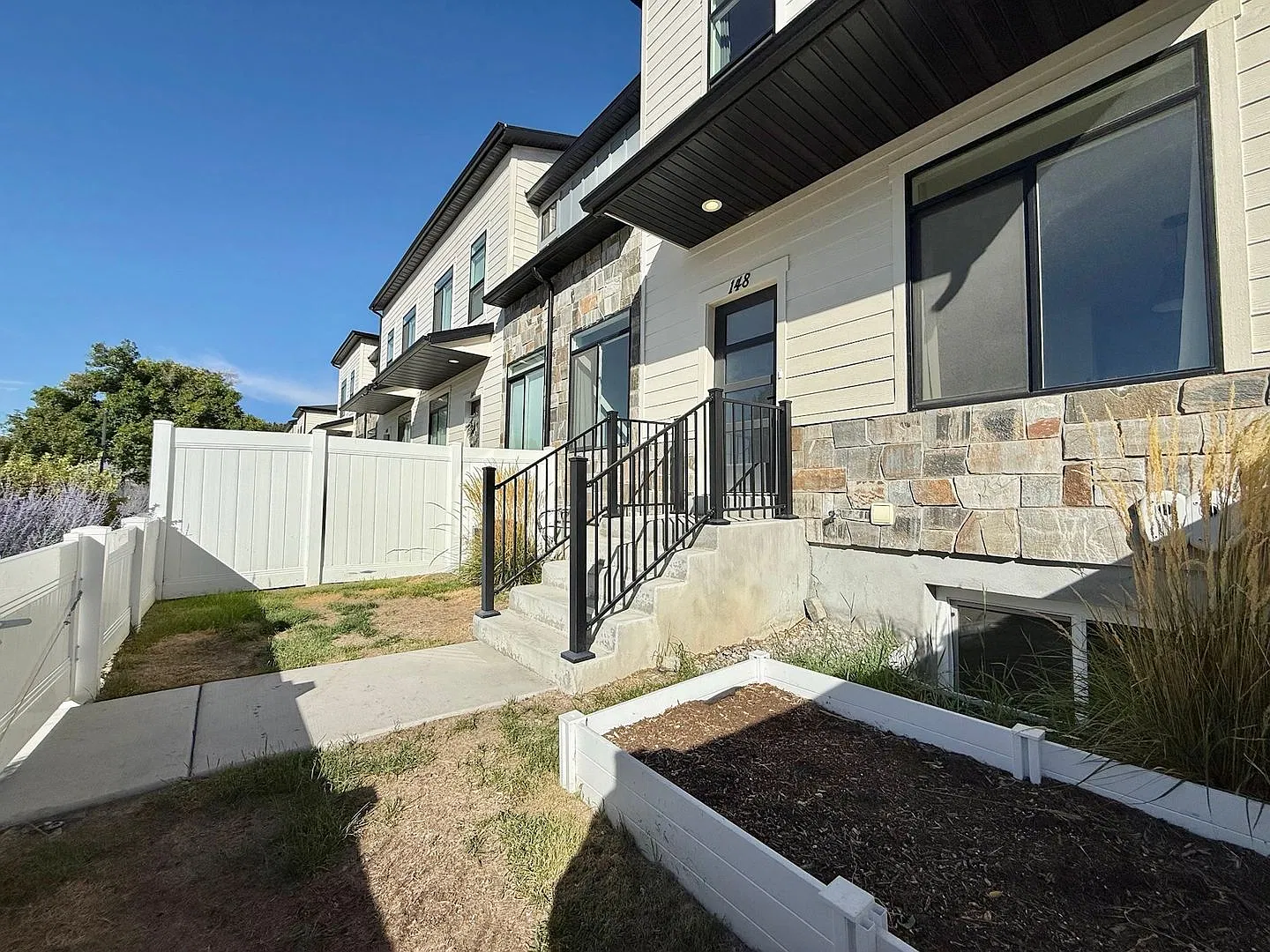 4-Bedroom Midvale Townhome | Garage + Pets Allowed + Great Location — Photo 2