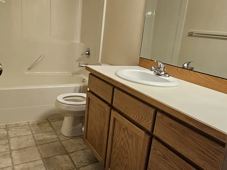 Full bath - located next to 2nd and 3rd bedrooms
