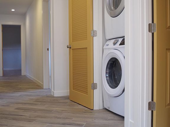 New washer/dryer in hideaway closet