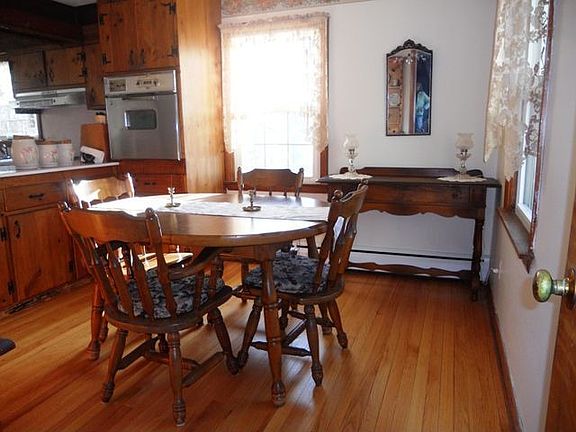 Formal dining room with gleaming hardwood floors