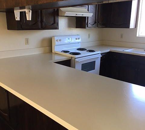 Kitchen, lots of cabinets and counter space. Opens to family