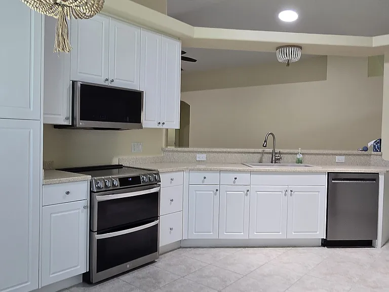 Kitchen with New LG and Kitchen Aid Appliances and Solar Tube
