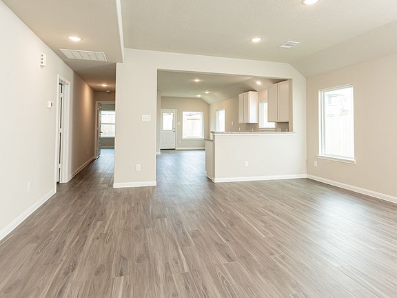 Family Room to Kitchen and Dining Area