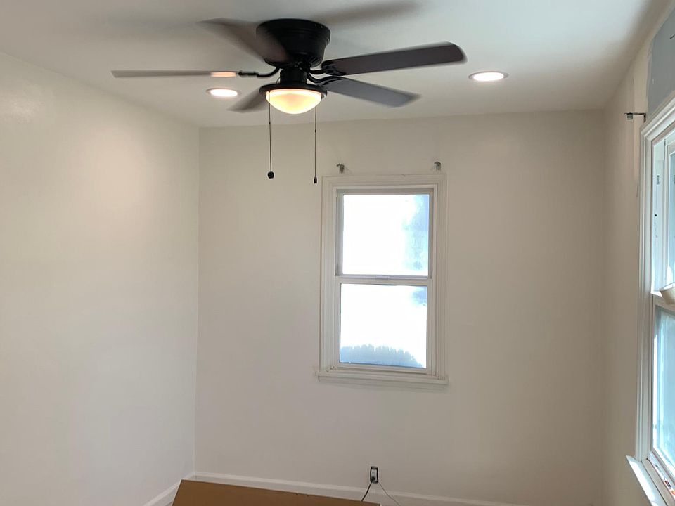 Living room w new led lights and fan