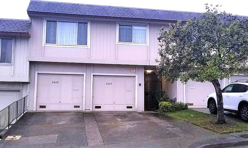 Garage is on the right of driveway. Garage with driveway can park 3 cars