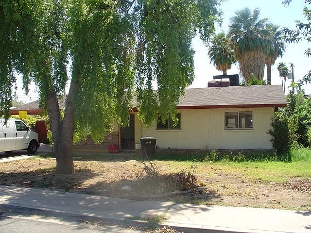 1st image of 855 E 6th Ave