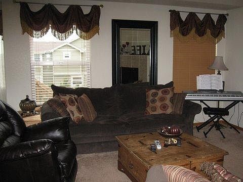 Living area includes gas fireplace with back up battery and shades.