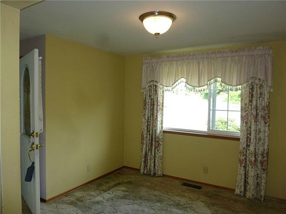 Formal dining room off of living/kitchen