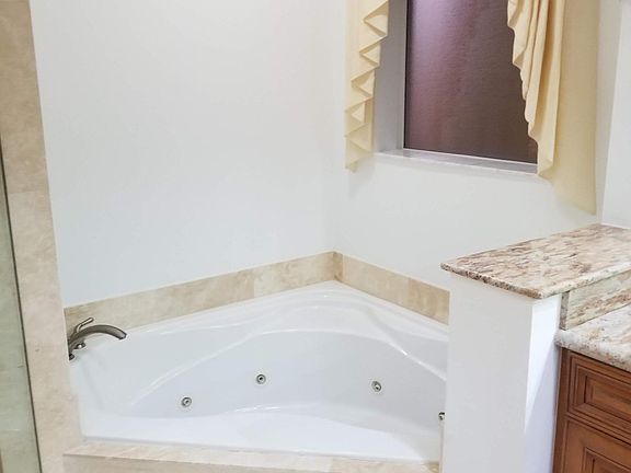 Jetted bathtub in Master Bathroom