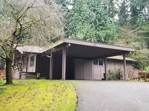Carport, front deck and entry